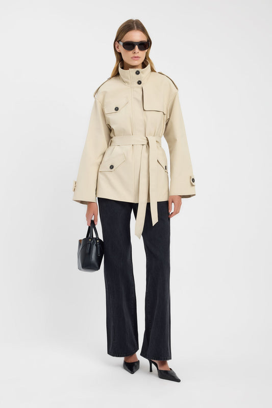 Beige belted funnel-neck trench