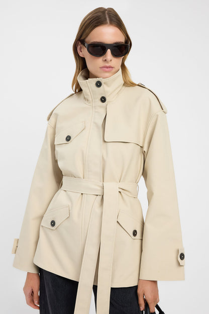 Beige belted funnel-neck trench
