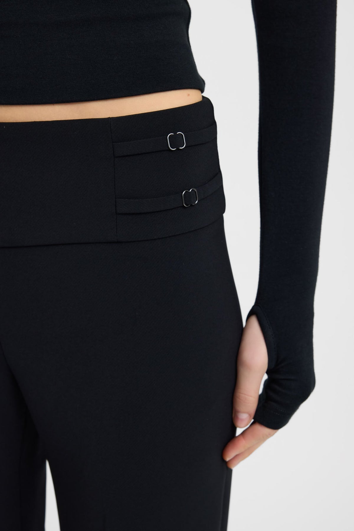 Black wide-leg trousers – waistband detail