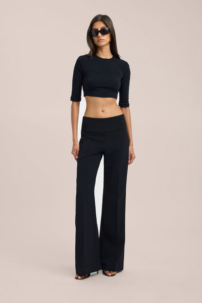 Black wide-leg trousers with crop top